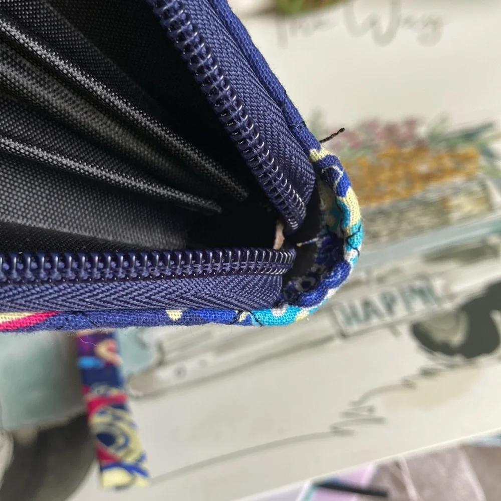 Paisley print wristlet ITEMS $8 or less BOGO . Bundle I will discount.